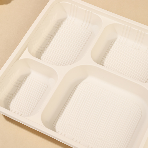 Durable six-compartment cornstarch tray, eco-friendly for takeout and catering.