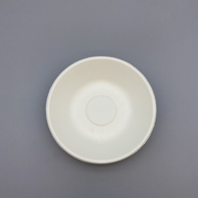 14oz bagasse bowl, eco-friendly for soups and salads at restaurants.