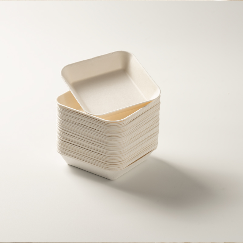 Eco-friendly biodegradable dessert tray, perfect for cakes and nuts.