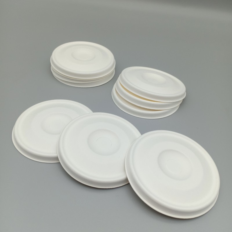80mm sugarcane flat lid, compostable for iced coffee and juice.